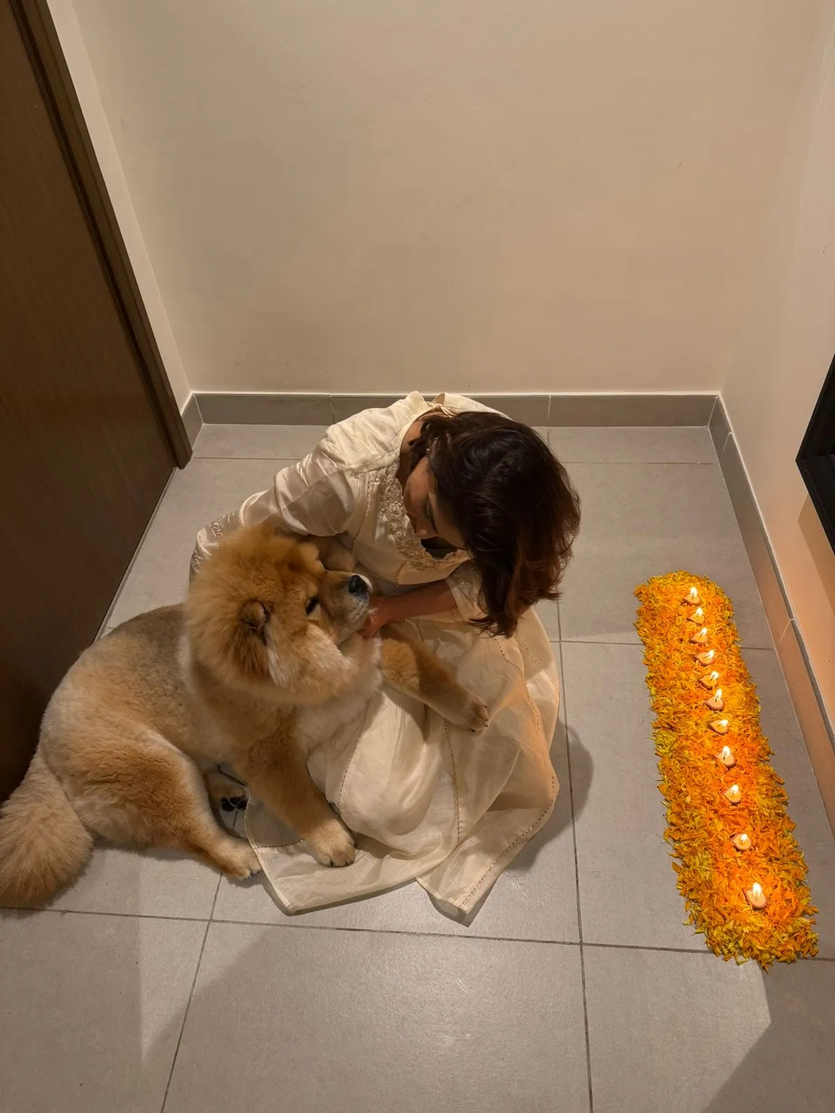 Zoey patiently sitting with mom and understanding what Diwali is all about!&nbsp;